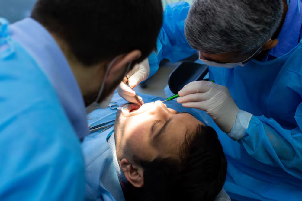 dentists examine patient's teeth
