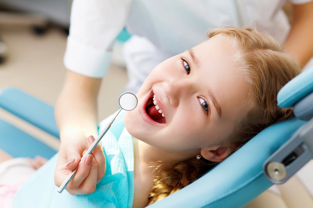 protect your child's oral health with these tips