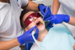 a kid is having root canal treatment